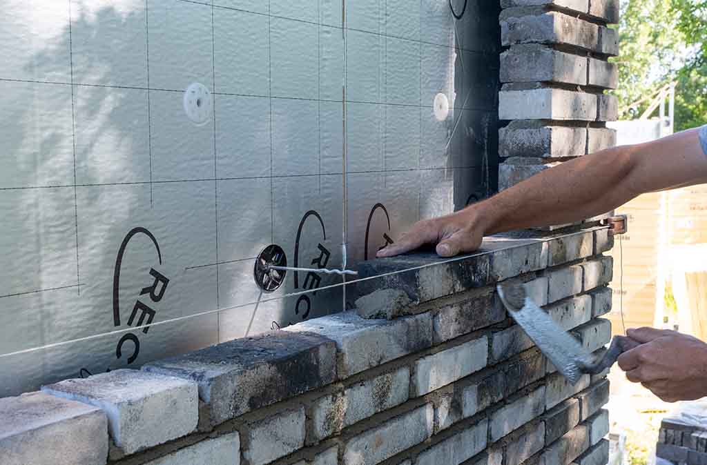 Ventilatie van de spouwmuur en de RCwaarde Recticel Insulation